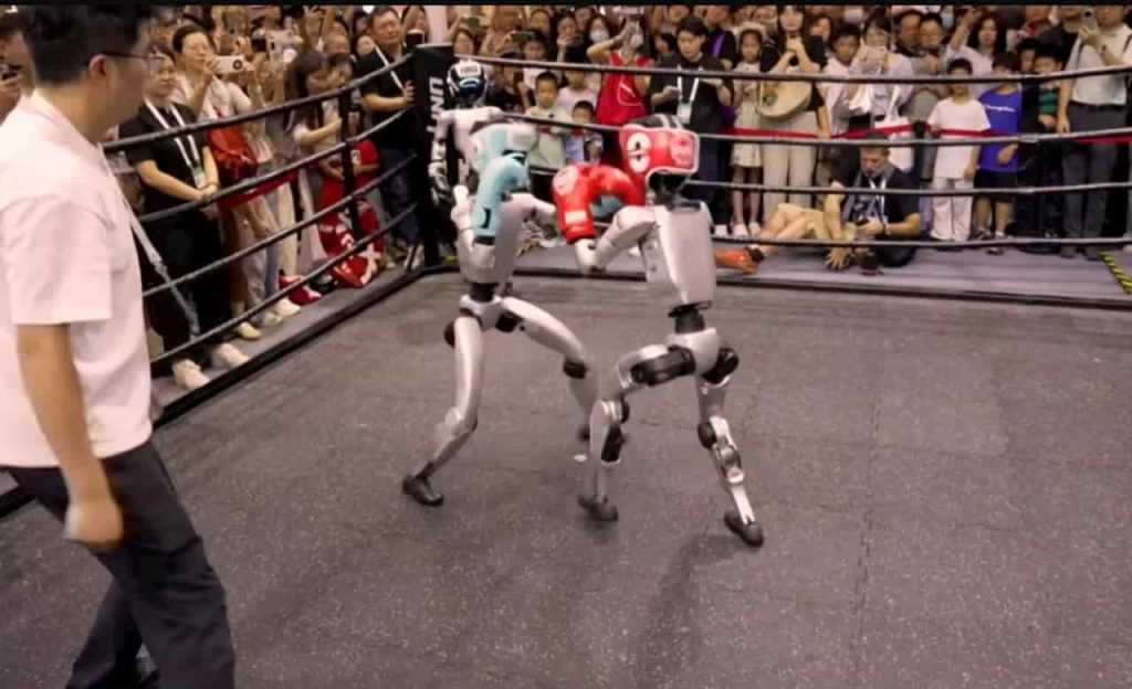 Istorinis įvykis: robotai iš 16 šalių varžėsi pirmojoje pasaulyje humanoidų olimpiadoje (video)